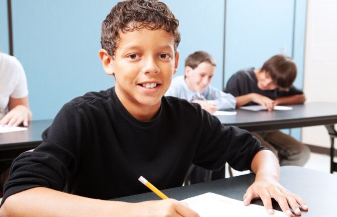 secondary school boy waiting for results