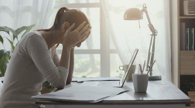 stock-image-burnout-young-person-desk