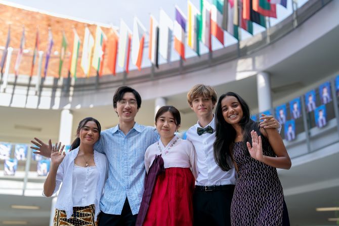 ISKL-group-of-students-waving